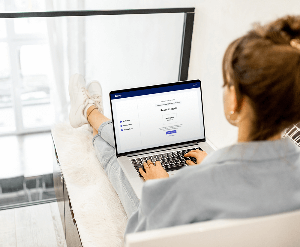 A woman logging on to a RON eClosing session on the Stavvy Platform A woman logging on to a RON eClosing session on the Stavvy Platform